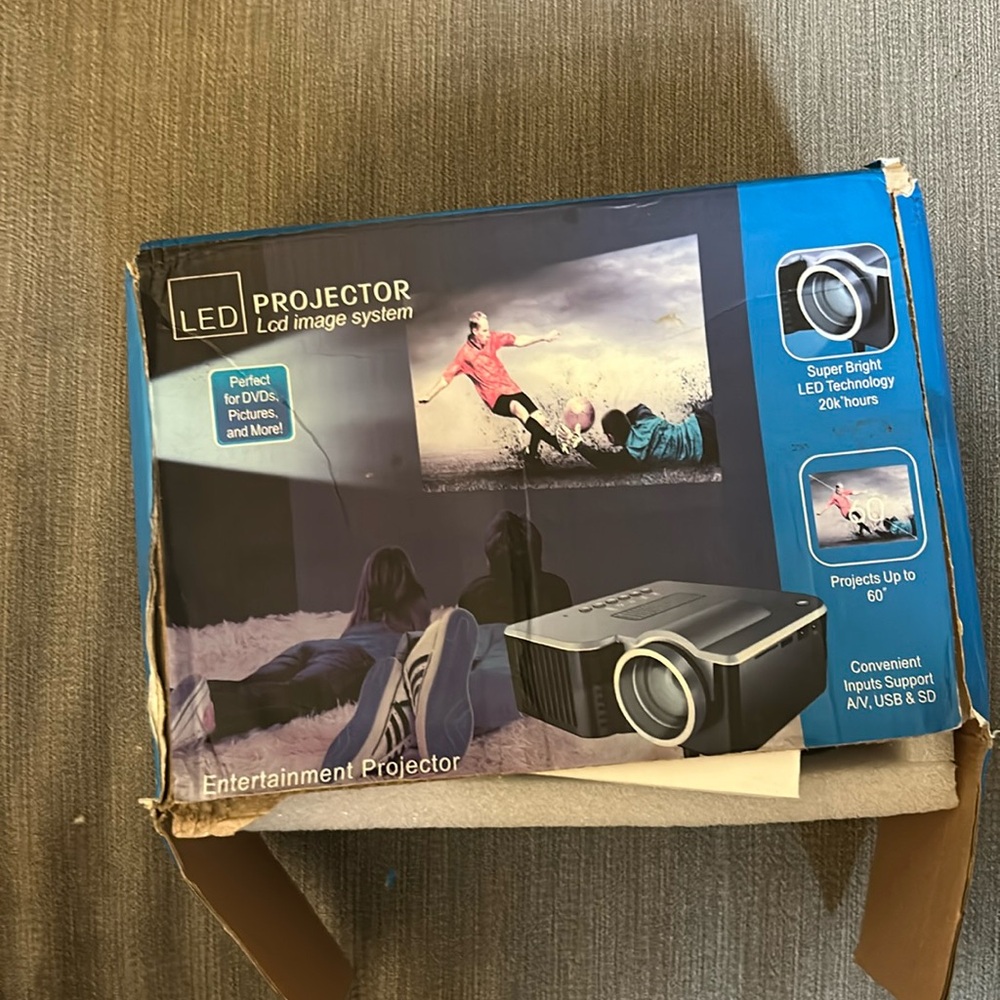 LED Projector still with Box.  Tested once.